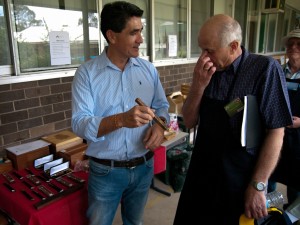 State MP Dr Geoff Lee discussing pen pricing